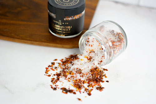 Jocelyn & Co. Black & Gold Calabrian Chili Finishing Salt jar close-up detail