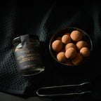 Open box of Jocelyn & Co. Cocoa Cappuccino Cordials showing chocolate-covered cordials