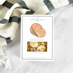 Jocelyn & Co. artisan water crackers in signature box packaging on marble surface