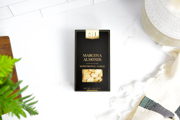 Jocelyn & Co. Black & Gold Garlic Truffle Marcona Almonds in premium black and gold luxury packaging