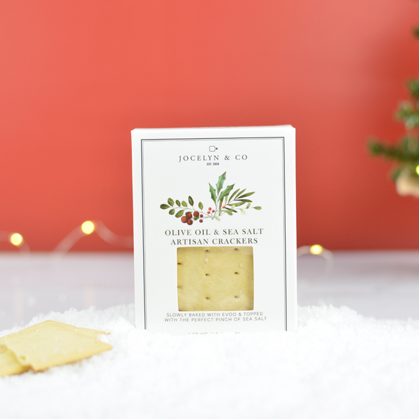 Jocelyn & Co. Holiday Mini Olive Oil & Sea Salt Crackers in festive seasonal packaging