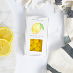 Jocelyn & Co. Lemon Sours candy in bright yellow signature packaging