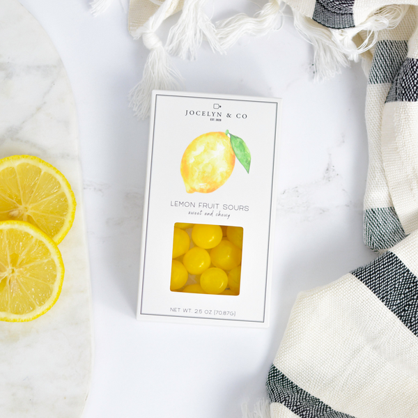 Jocelyn & Co. Lemon Sours candy in bright yellow signature packaging