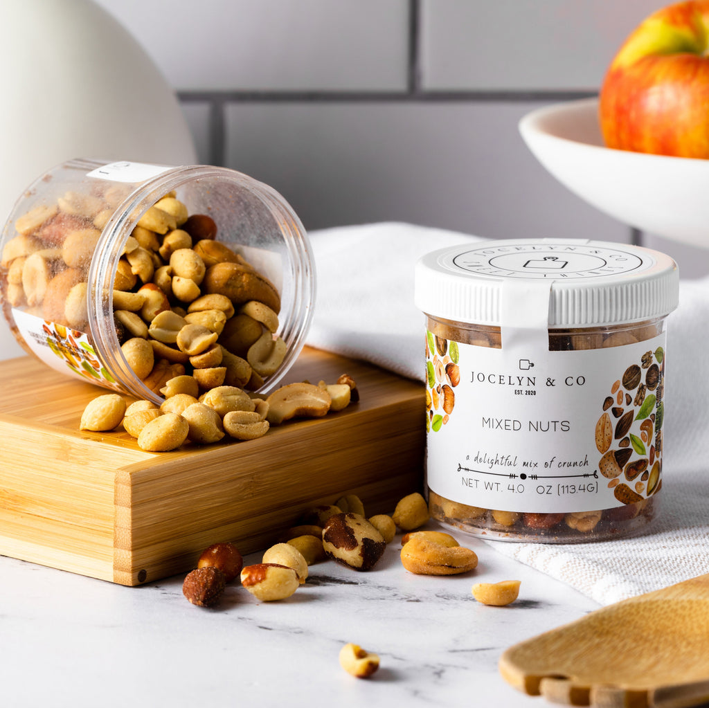 Jocelyn & Co. mixed nuts in clear glass jar with minimalist artisan label