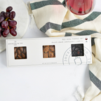 Jocelyn & Co. Red Wine Pairing Set with artisan crackers, cheese spread, and red wine accompaniments