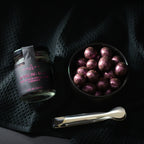 Open box of Jocelyn & Co. Sparkling Rosé Cordials showing chocolate-covered cordials
