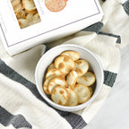 Jocelyn & Co. water crackers in signature packaging, styled on a white surface
